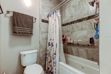 Welcome home to this beautifully updated three-bedroom, two-bath on Palm Hill Golf Club in Florida - for sale on GolfHomes.com, golf home, golf lot