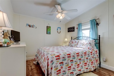 Welcome home to this beautifully updated three-bedroom, two-bath on Palm Hill Golf Club in Florida - for sale on GolfHomes.com, golf home, golf lot