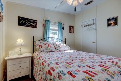 Welcome home to this beautifully updated three-bedroom, two-bath on Palm Hill Golf Club in Florida - for sale on GolfHomes.com, golf home, golf lot