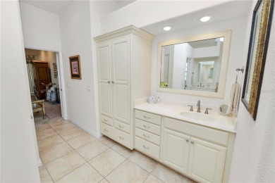 This is an immaculate 4 bedroom / 3 Bathroom one level Pool home on Grasslands Golf and Country Club in Florida - for sale on GolfHomes.com, golf home, golf lot