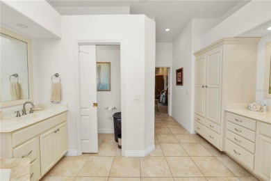 This is an immaculate 4 bedroom / 3 Bathroom one level Pool home on Grasslands Golf and Country Club in Florida - for sale on GolfHomes.com, golf home, golf lot