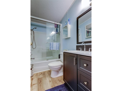 Welcome home to this beautifully updated three-bedroom, two-bath on Palm Hill Golf Club in Florida - for sale on GolfHomes.com, golf home, golf lot