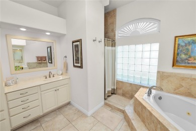 This is an immaculate 4 bedroom / 3 Bathroom one level Pool home on Grasslands Golf and Country Club in Florida - for sale on GolfHomes.com, golf home, golf lot