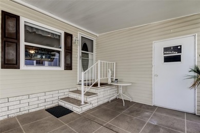 Welcome home to this beautifully updated three-bedroom, two-bath on Palm Hill Golf Club in Florida - for sale on GolfHomes.com, golf home, golf lot