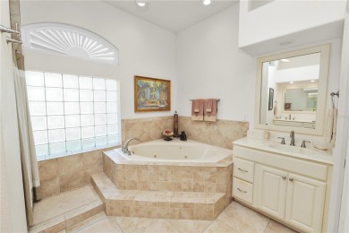 This is an immaculate 4 bedroom / 3 Bathroom one level Pool home on Grasslands Golf and Country Club in Florida - for sale on GolfHomes.com, golf home, golf lot