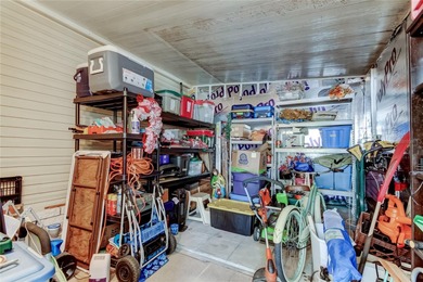 Welcome home to this beautifully updated three-bedroom, two-bath on Palm Hill Golf Club in Florida - for sale on GolfHomes.com, golf home, golf lot