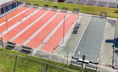 Welcome home to this beautifully updated three-bedroom, two-bath on Palm Hill Golf Club in Florida - for sale on GolfHomes.com, golf home, golf lot