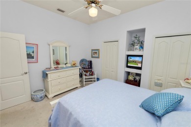 This is an immaculate 4 bedroom / 3 Bathroom one level Pool home on Grasslands Golf and Country Club in Florida - for sale on GolfHomes.com, golf home, golf lot
