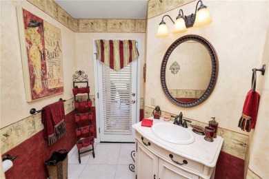 This is an immaculate 4 bedroom / 3 Bathroom one level Pool home on Grasslands Golf and Country Club in Florida - for sale on GolfHomes.com, golf home, golf lot