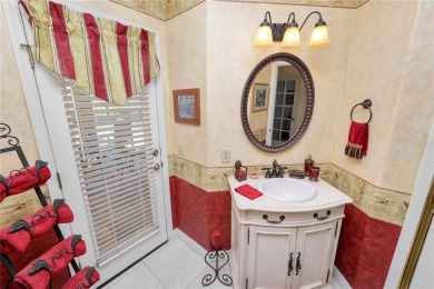 This is an immaculate 4 bedroom / 3 Bathroom one level Pool home on Grasslands Golf and Country Club in Florida - for sale on GolfHomes.com, golf home, golf lot