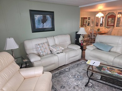 Move in ready! Complete with high end furnishings! Zebra blinds on Grasslands Golf and Country Club in Florida - for sale on GolfHomes.com, golf home, golf lot