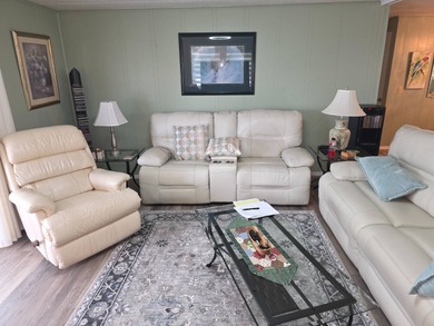 Move in ready! Complete with high end furnishings! Zebra blinds on Grasslands Golf and Country Club in Florida - for sale on GolfHomes.com, golf home, golf lot