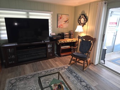 Move in ready! Complete with high end furnishings! Zebra blinds on Grasslands Golf and Country Club in Florida - for sale on GolfHomes.com, golf home, golf lot