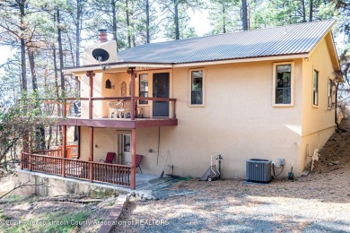 Welcome to your cozy mountain home on a corner lot in Alto on Alto Lakes Golf and Country Club in New Mexico - for sale on GolfHomes.com, golf home, golf lot