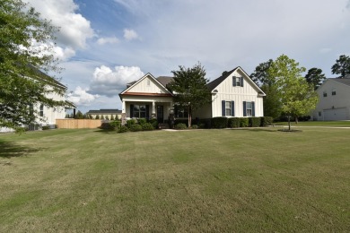 Discover your dream home in this exquisite Craftsman-style on Bartram Trail Golf Club in Georgia - for sale on GolfHomes.com, golf home, golf lot