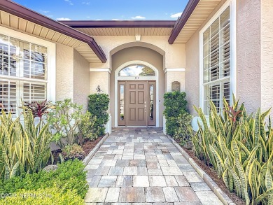 Immaculate concrete block home with high and coffered ceilings on Marsh Creek Country Club in Florida - for sale on GolfHomes.com, golf home, golf lot