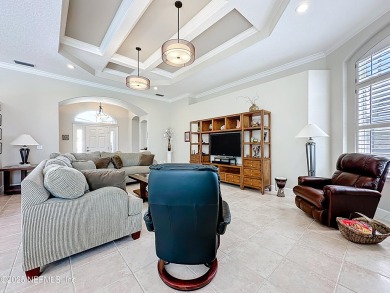Immaculate concrete block home with high and coffered ceilings on Marsh Creek Country Club in Florida - for sale on GolfHomes.com, golf home, golf lot