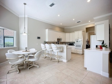 Immaculate concrete block home with high and coffered ceilings on Marsh Creek Country Club in Florida - for sale on GolfHomes.com, golf home, golf lot