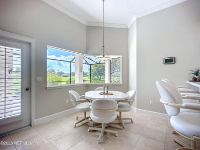 Immaculate concrete block home with high and coffered ceilings on Marsh Creek Country Club in Florida - for sale on GolfHomes.com, golf home, golf lot