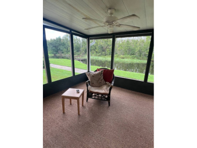 Charming Updated and Modern home with privacy and stunning water on Lake Henry Golf Club in Florida - for sale on GolfHomes.com, golf home, golf lot