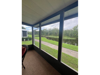 Charming Updated and Modern home with privacy and stunning water on Lake Henry Golf Club in Florida - for sale on GolfHomes.com, golf home, golf lot