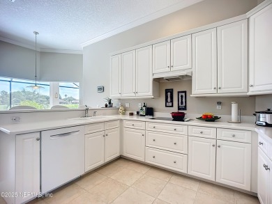 Immaculate concrete block home with high and coffered ceilings on Marsh Creek Country Club in Florida - for sale on GolfHomes.com, golf home, golf lot