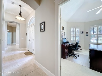 Immaculate concrete block home with high and coffered ceilings on Marsh Creek Country Club in Florida - for sale on GolfHomes.com, golf home, golf lot