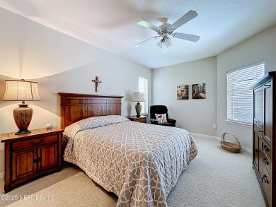 Immaculate concrete block home with high and coffered ceilings on Marsh Creek Country Club in Florida - for sale on GolfHomes.com, golf home, golf lot