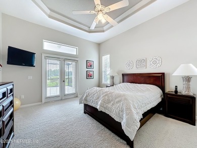 Immaculate concrete block home with high and coffered ceilings on Marsh Creek Country Club in Florida - for sale on GolfHomes.com, golf home, golf lot