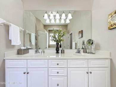 Immaculate concrete block home with high and coffered ceilings on Marsh Creek Country Club in Florida - for sale on GolfHomes.com, golf home, golf lot