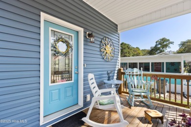Welcome to this charming 2-bedroom, 2-bath home located just a on Oyster Bay Golf Links in North Carolina - for sale on GolfHomes.com, golf home, golf lot