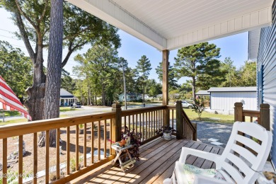 Welcome to this charming 2-bedroom, 2-bath home located just a on Oyster Bay Golf Links in North Carolina - for sale on GolfHomes.com, golf home, golf lot