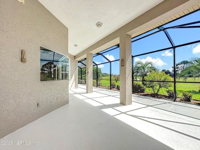 Immaculate concrete block home with high and coffered ceilings on Marsh Creek Country Club in Florida - for sale on GolfHomes.com, golf home, golf lot
