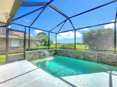 Immaculate concrete block home with high and coffered ceilings on Marsh Creek Country Club in Florida - for sale on GolfHomes.com, golf home, golf lot