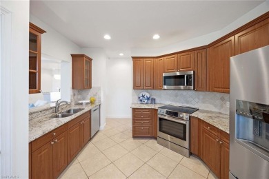 Come see this beautiful first-floor carriage home on the golf on The Colony Golf and Country Club in Florida - for sale on GolfHomes.com, golf home, golf lot