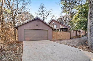 Nestled in Bella Vista, this one-of-a-kind retreat is surrounded on Bella Vista - Metfield Golf Complex and Country Club in Arkansas - for sale on GolfHomes.com, golf home, golf lot