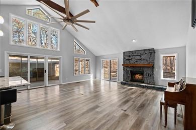 Nestled in Bella Vista, this one-of-a-kind retreat is surrounded on Bella Vista - Metfield Golf Complex and Country Club in Arkansas - for sale on GolfHomes.com, golf home, golf lot