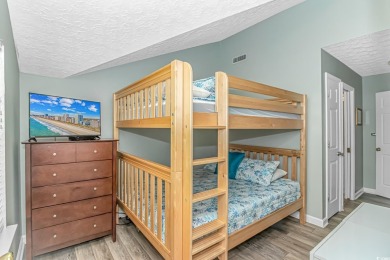 This spacious 4 LARGE Bedroom 4 Bath raised beach house is just on Prestwick Country Club in South Carolina - for sale on GolfHomes.com, golf home, golf lot