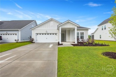 This beautifully maintained 3-bedroom, 2-bathroom residence on Savannah Quarters Country Club in Georgia - for sale on GolfHomes.com, golf home, golf lot
