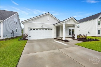 This beautifully maintained 3-bedroom, 2-bathroom residence on Savannah Quarters Country Club in Georgia - for sale on GolfHomes.com, golf home, golf lot
