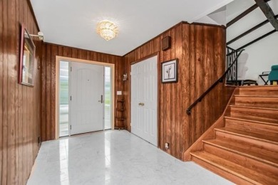 Meticulously maintained split-level home in Elmsford with major on Elmwood Country Club in New York - for sale on GolfHomes.com, golf home, golf lot