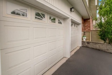 Meticulously maintained split-level home in Elmsford with major on Elmwood Country Club in New York - for sale on GolfHomes.com, golf home, golf lot