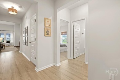 This beautifully maintained 3-bedroom, 2-bathroom residence on Savannah Quarters Country Club in Georgia - for sale on GolfHomes.com, golf home, golf lot