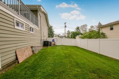 Meticulously maintained split-level home in Elmsford with major on Elmwood Country Club in New York - for sale on GolfHomes.com, golf home, golf lot