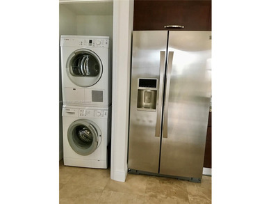 Corner residence, 2 bedroom 2 bathroom located in the heart of on Turnberry Isle Resort and Club in Florida - for sale on GolfHomes.com, golf home, golf lot