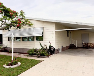 SELLER IS MOTIVATED!! This charming 2-bedroom, 2-bathroom home on Barefoot Bay Golf Course in Florida - for sale on GolfHomes.com, golf home, golf lot