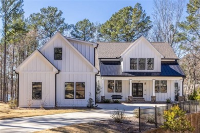 Nestled on a breathtaking 0.76-acre lot in the prestigious on Harbor Club Golf and Country Club in Georgia - for sale on GolfHomes.com, golf home, golf lot
