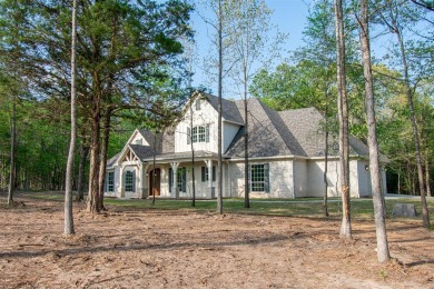 NEW CONSTRUCTION! Modern farmhouse on 2.47 wooded acres with on Hide-A-Way Lake Golf Course in Texas - for sale on GolfHomes.com, golf home, golf lot
