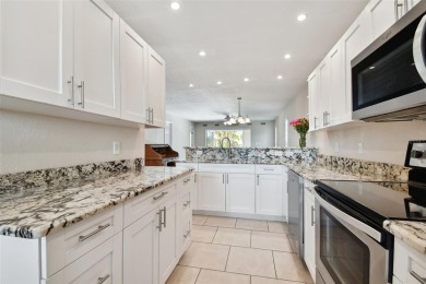 MOTIVATED SELLERS!!! MAKE OFFER!! TURN-KEY MOVE-IN READY! on Bayou Golf Club in Florida - for sale on GolfHomes.com, golf home, golf lot