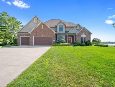 Experience refined waterfront living on Lake Wawasee in this on Wawasee Golf Club in Indiana - for sale on GolfHomes.com, golf home, golf lot